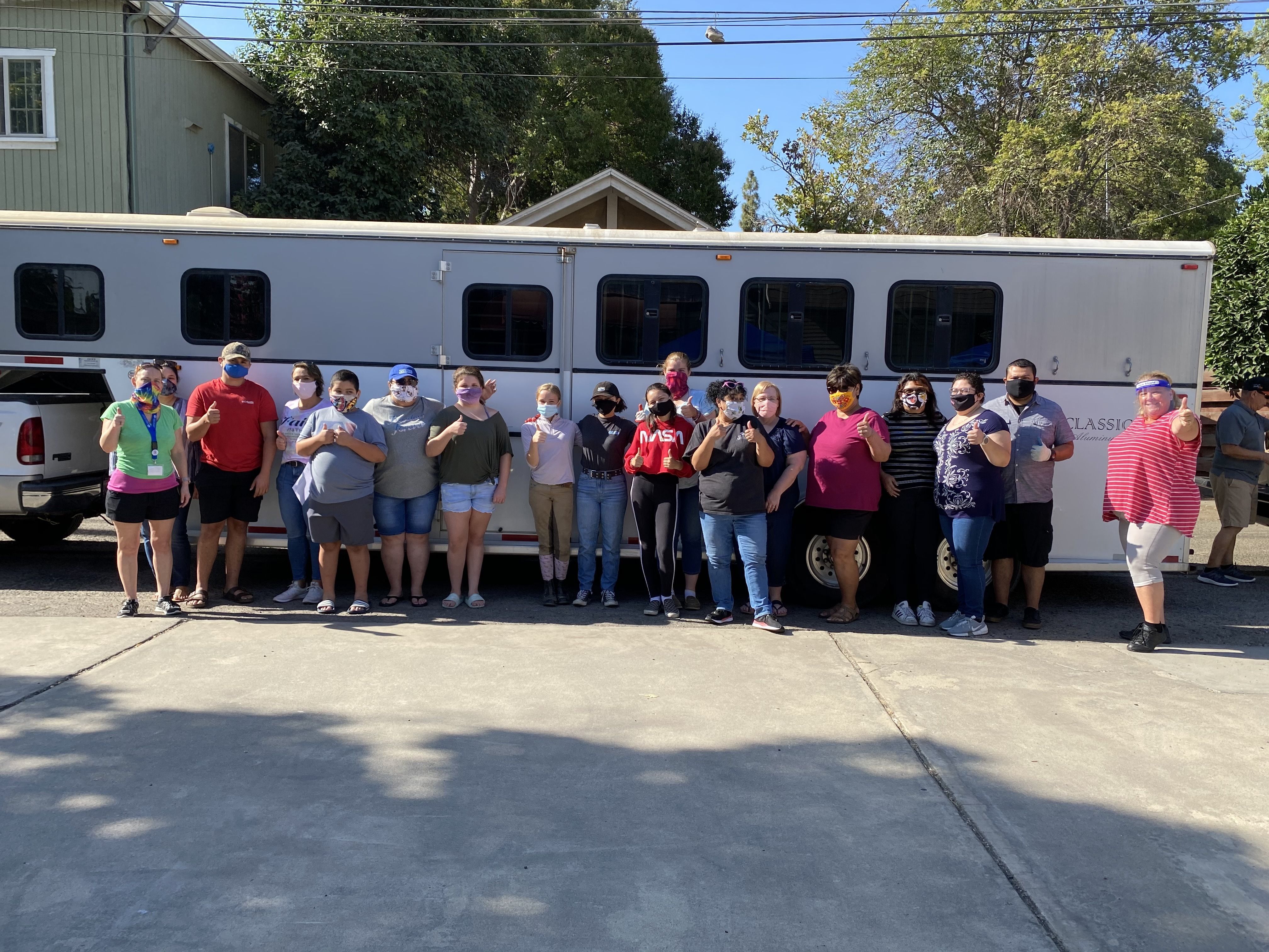 Work from the heart: Staff and partners deliver food boxes to families affected by COVID-19