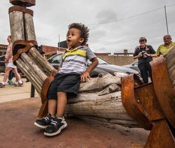 A cute little boy at the sculpture walk.