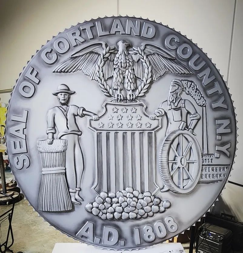 TA1048 - 10 ft diameter wall plaque of the Seal of Cortland County, New York,  carved in 3-D bas-relief