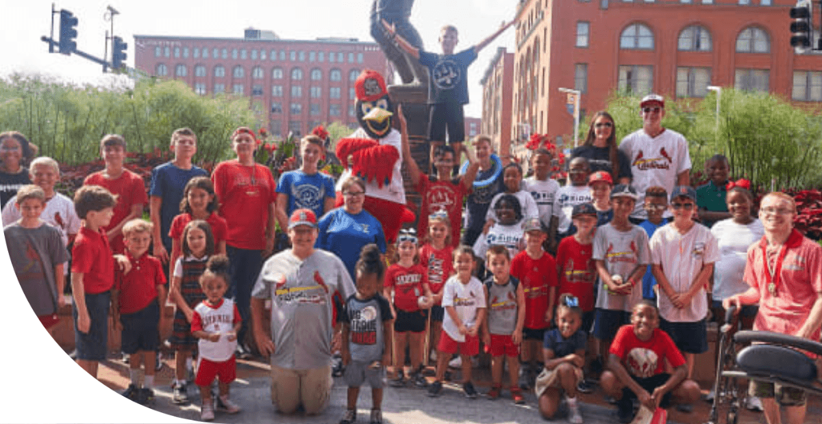 group of people wearing Cardinal shirts