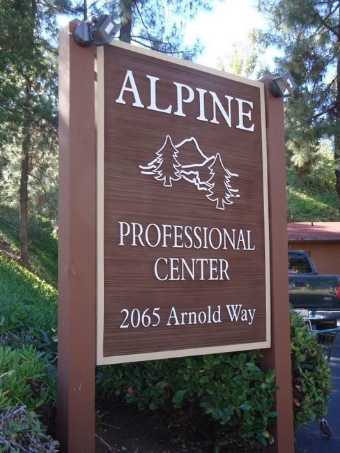 M4804 -  Two  4 " x 4" Cedar Wood Side Posts Supporting  a Sign for the Alpine Professional Center 