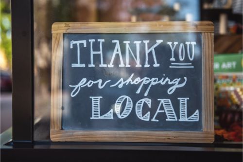 Chalkboard sign reading Thank You for Shopping Local