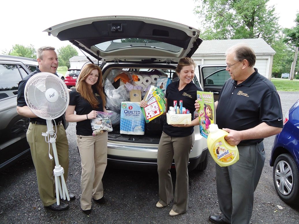 A local business with their community collection for AWP's shelter residents.