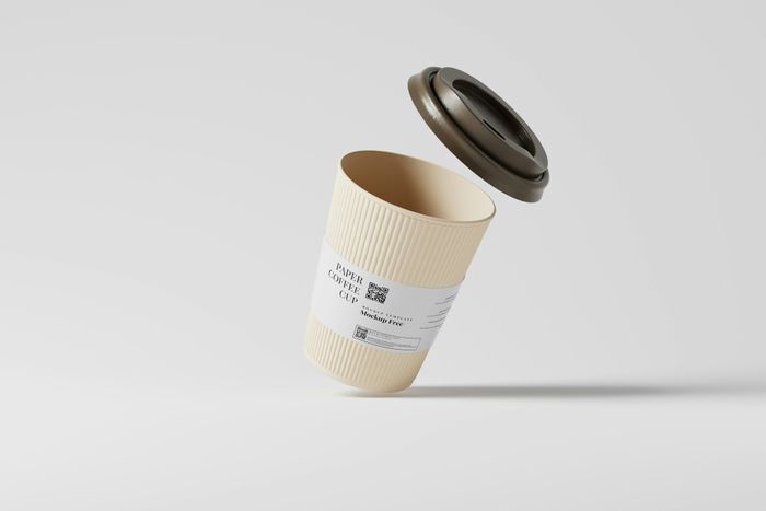 Ribbed sustainable e-commerce packaging cup featuring a printed QR code on sleeve for digital brand integration