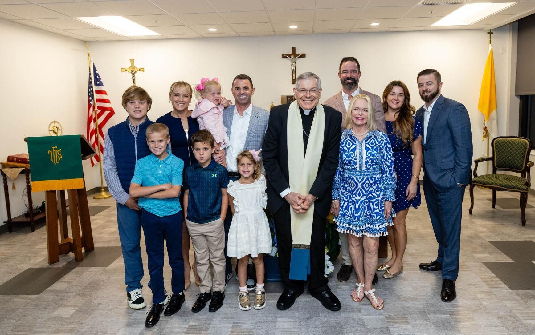 Bishop Gerald M. Barbarito stands with members of the Rendina family in the new Rendina Family Chapel