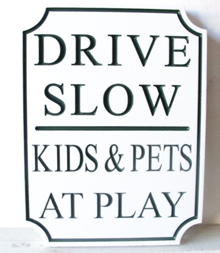 M9200 - Engraved White  & Green Color-Core High-Density Polyethylene (HDPE) "Drive Slow" Sign