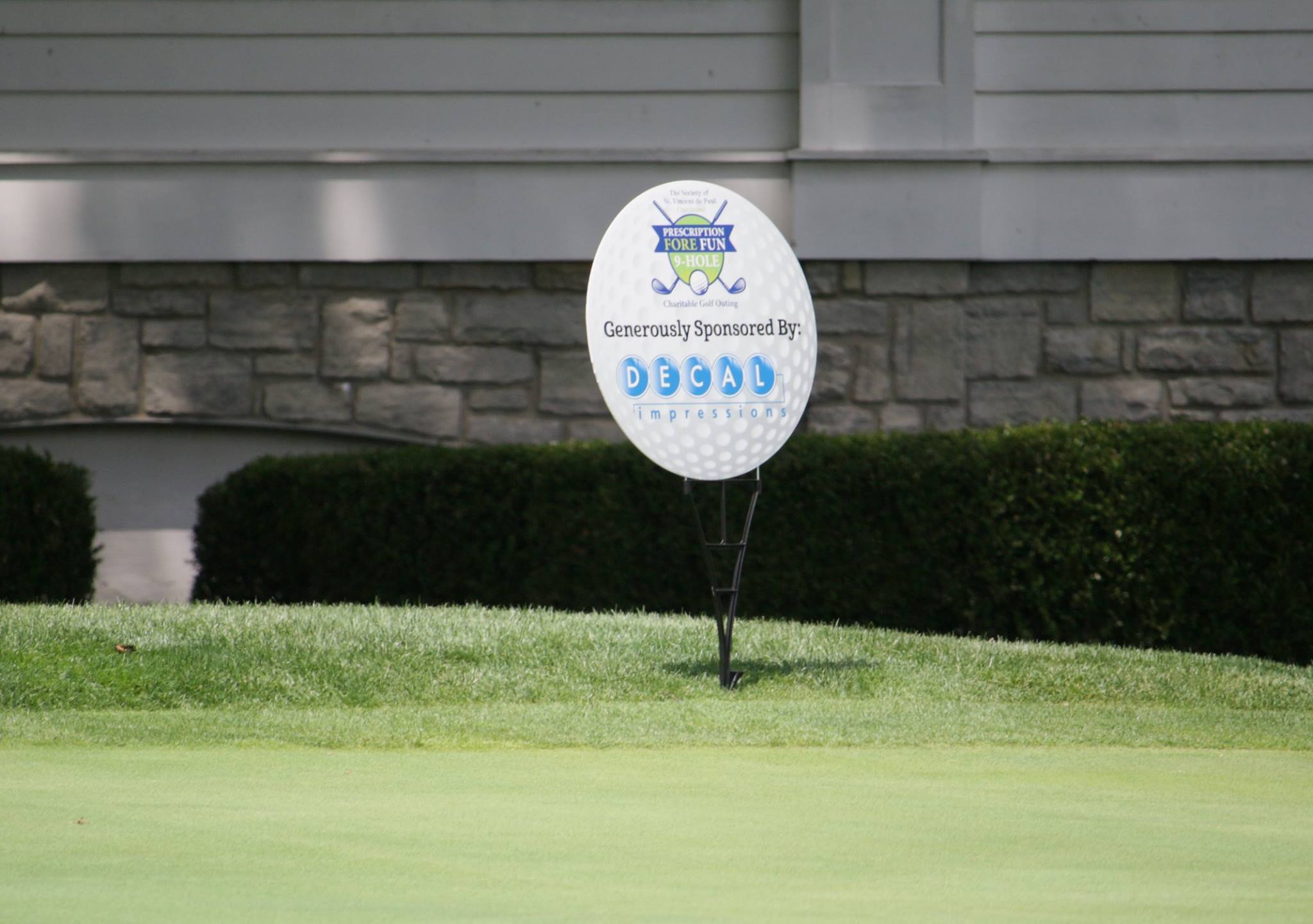 Golf ball shaped Yard Sign at St. Vincent De Paul Golf Fundraiser