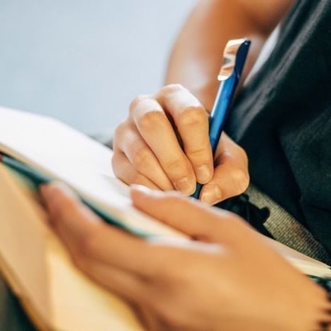 Volunteer from home writing letters to women in prison