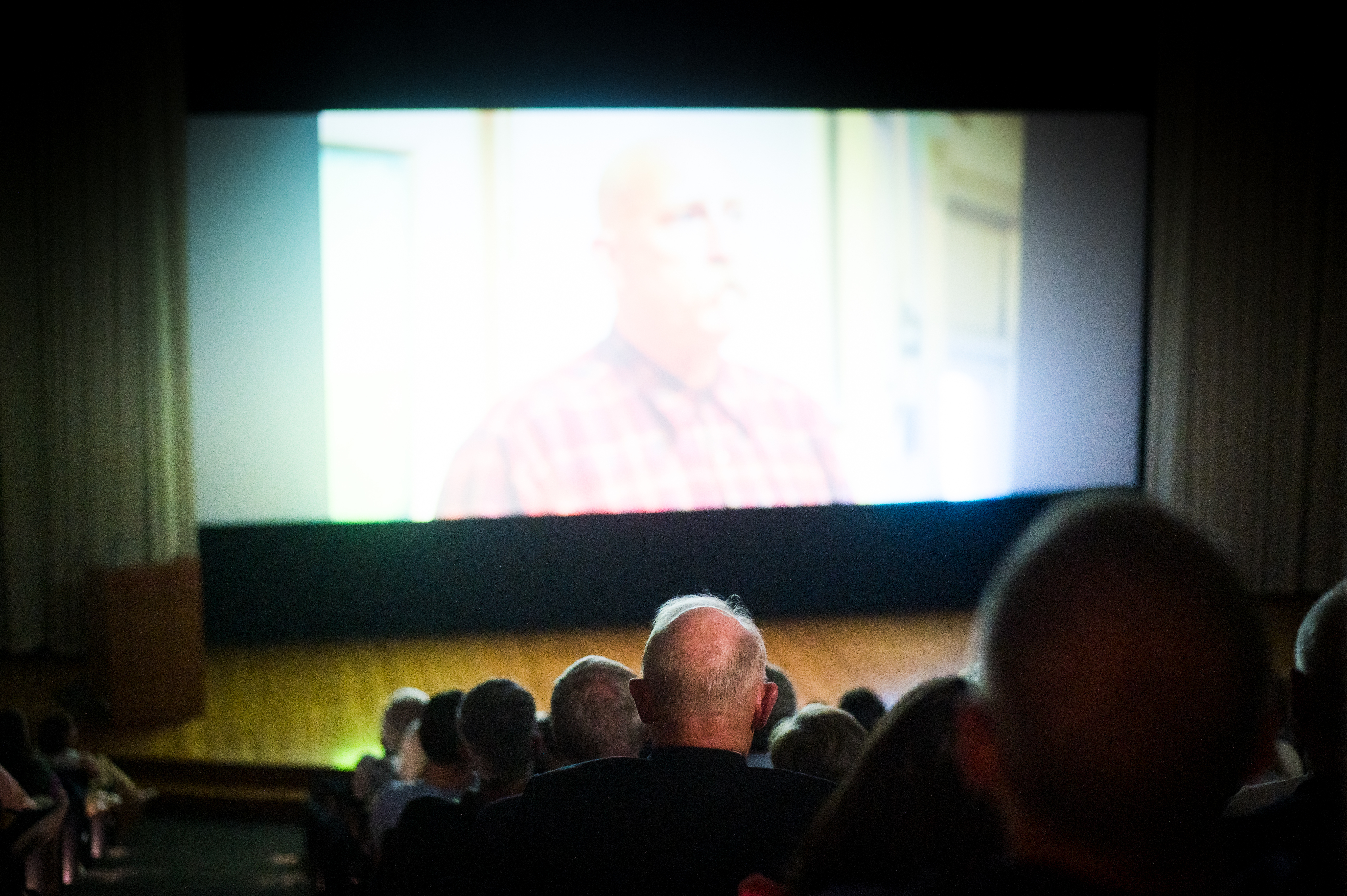 Attendees gather to watch Prosper Lincoln’s screening of the film Join or Die together at the Sheldon Museum of Art