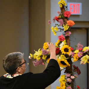 Photo of Easter Cross with flowers.