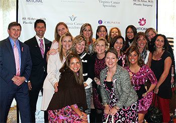 Group of people at a National Breast Center conference.