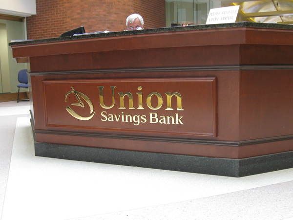 Interior Reception Area Lobby Sign,1/4" Polished Brass Letters on Reception Desk