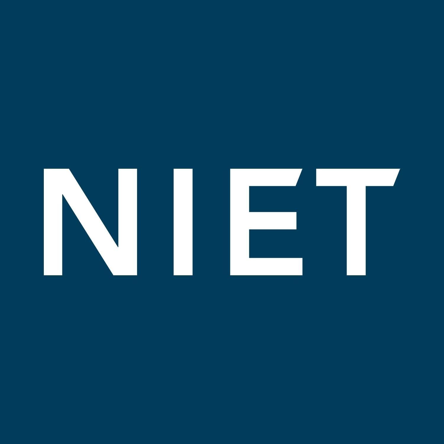 The image features a dark blue background with the white text "NIET" prominently displayed in the center. The text is in a bold, sans-serif font.