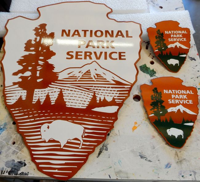 G16067 - Photo Illustrating Painted and Outline (Unpainted) National Park Service "Arrow" Emblems