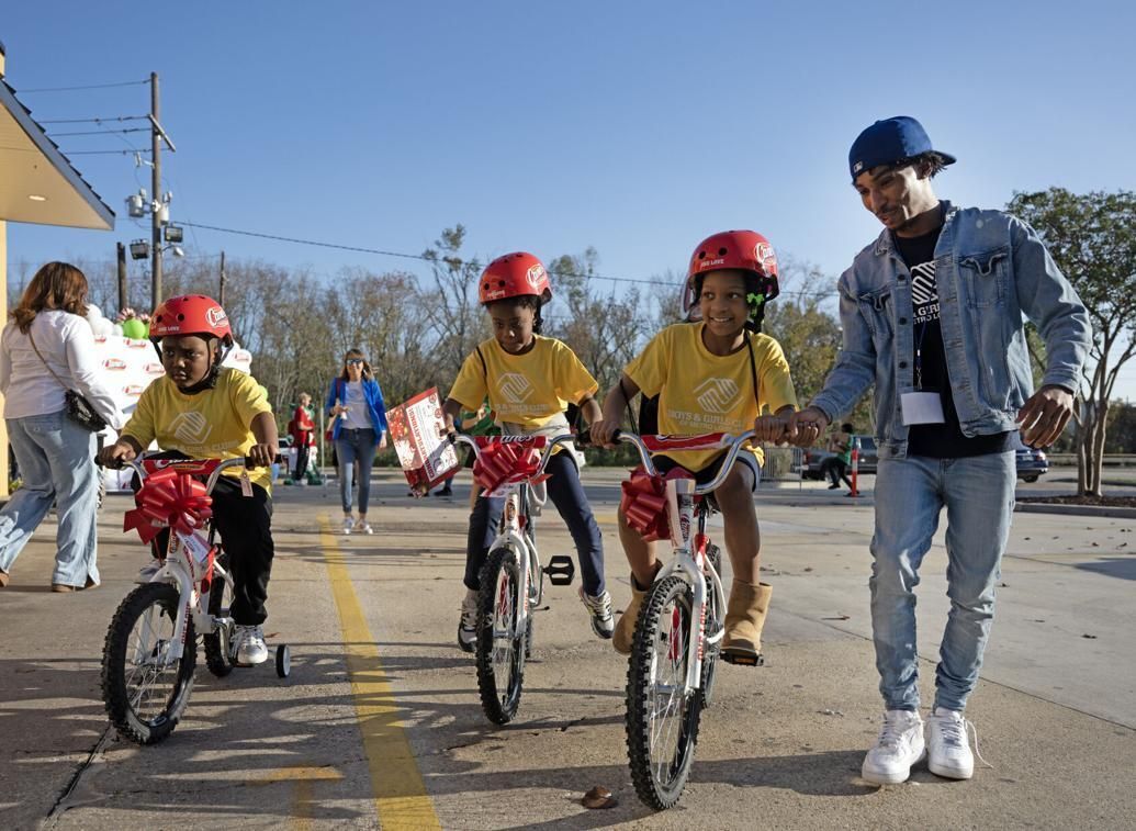 Raising Canes teams up with Front Yard Bikes to donate 100 bikes to local kids