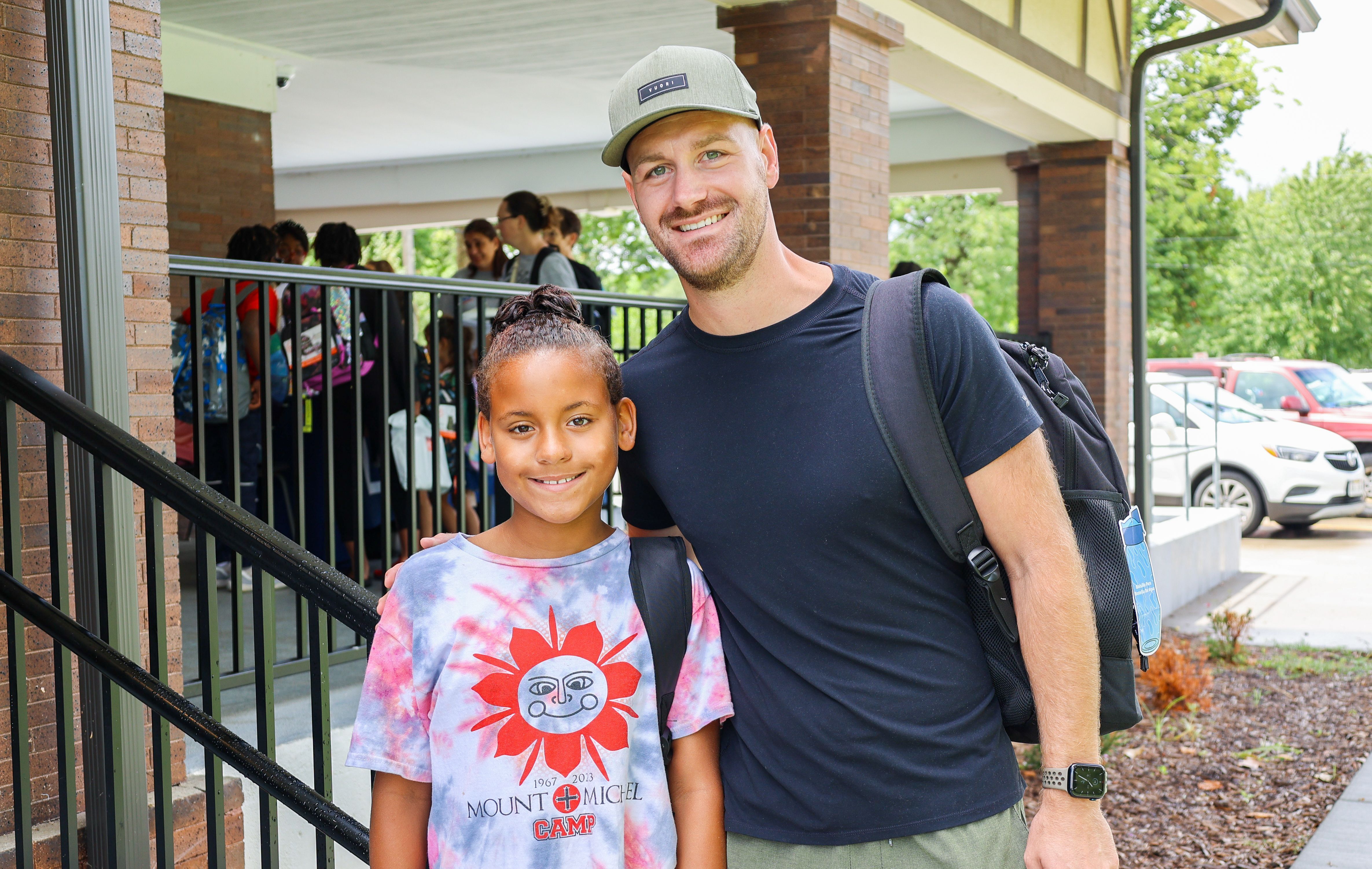Mentee and mentor posing together at our Back to School event