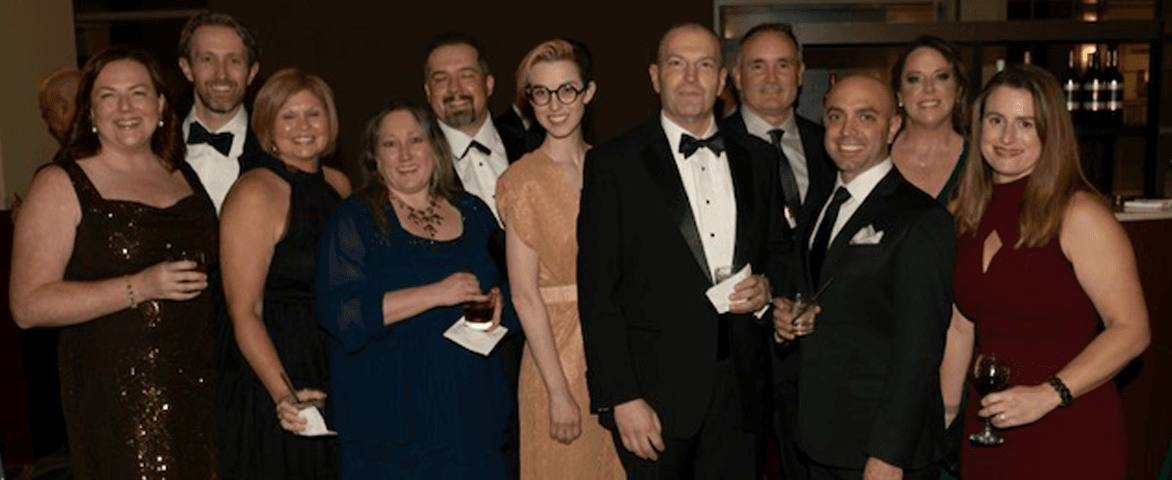 20th candlelight ball attendees during cocktail hour