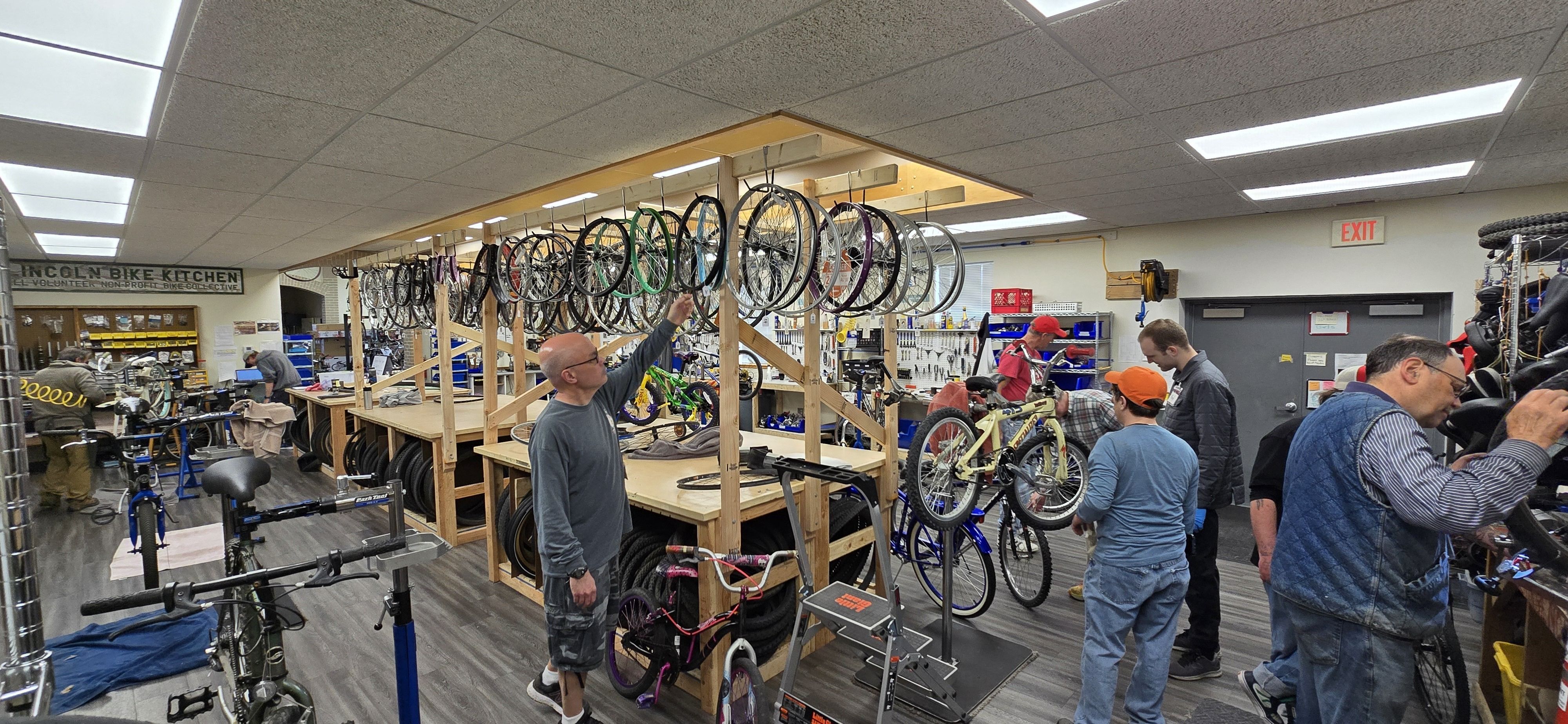 Crew members at bike shop