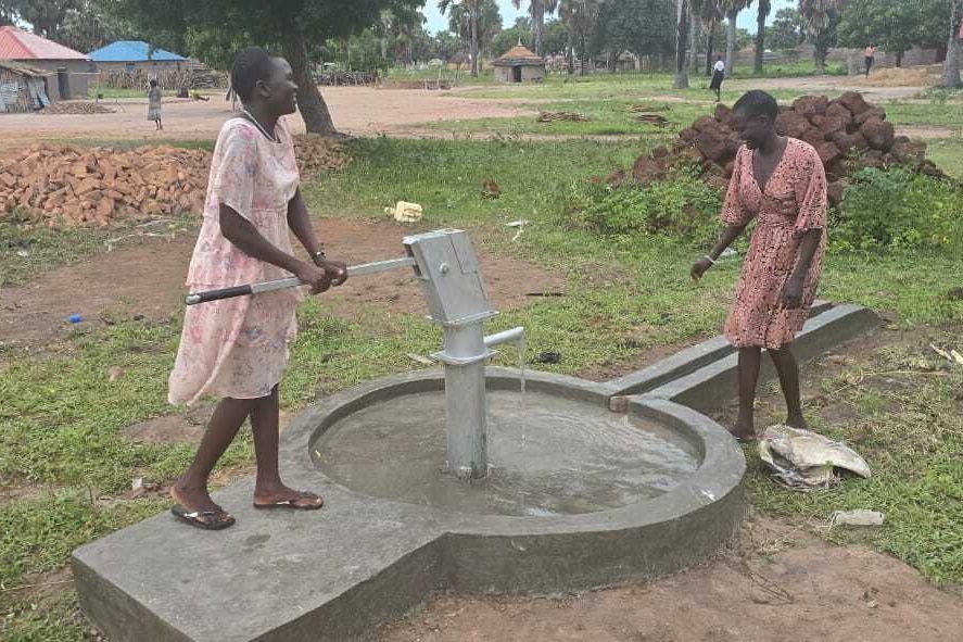 Girls at new well