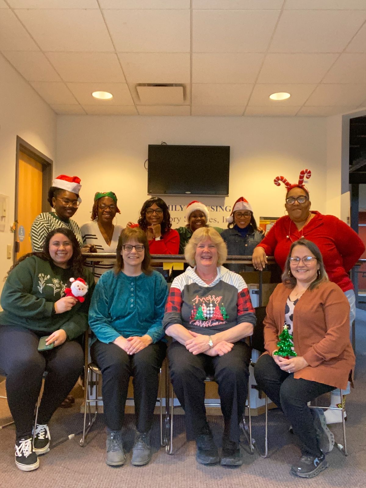 A group of individuals posing for a picture