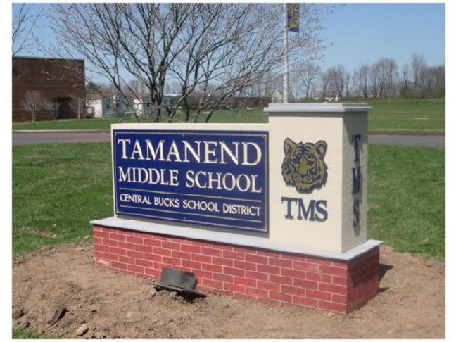 FA15700 -Entrance Monument Sign for Tamenend Middle School, with Tiger Logo on Monument Bases