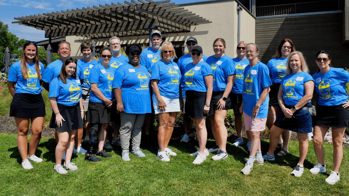 group of volunteers at golf tournament
