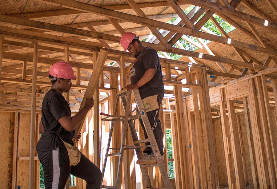 Volunteers building a home