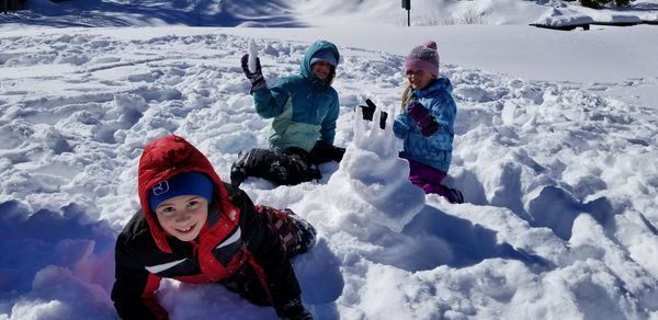 building snow caves at winter camp