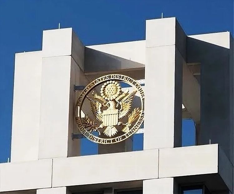 FP-1084- Large Gold-Leafed Medallion Mounted on Top of One of the Front Towers of the Middle District of Tennessee Federal Courthouse