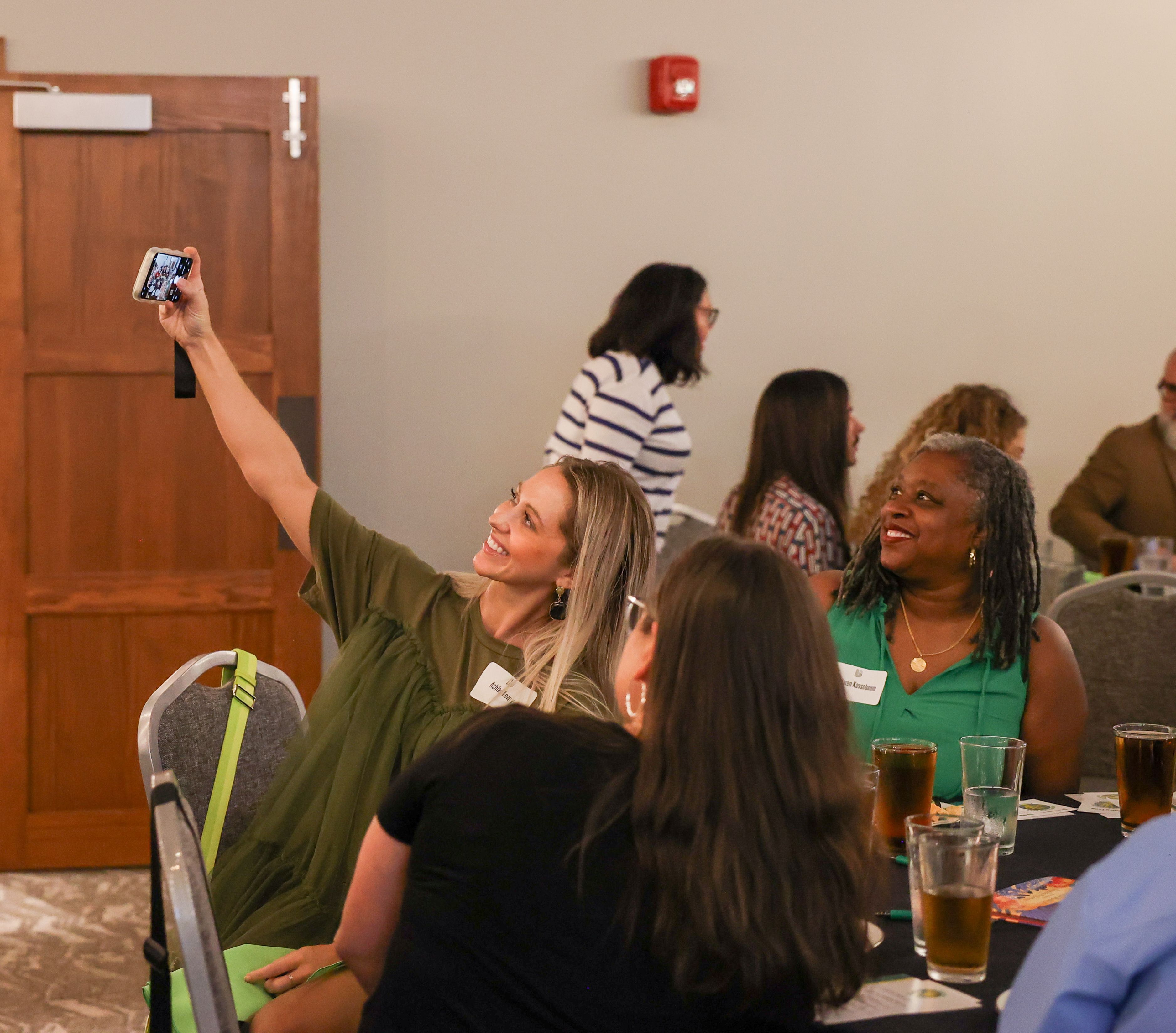 Attendees taking selfie together
