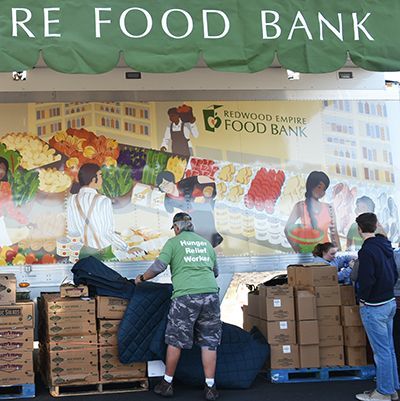 Volunteers setting up a food distribution site