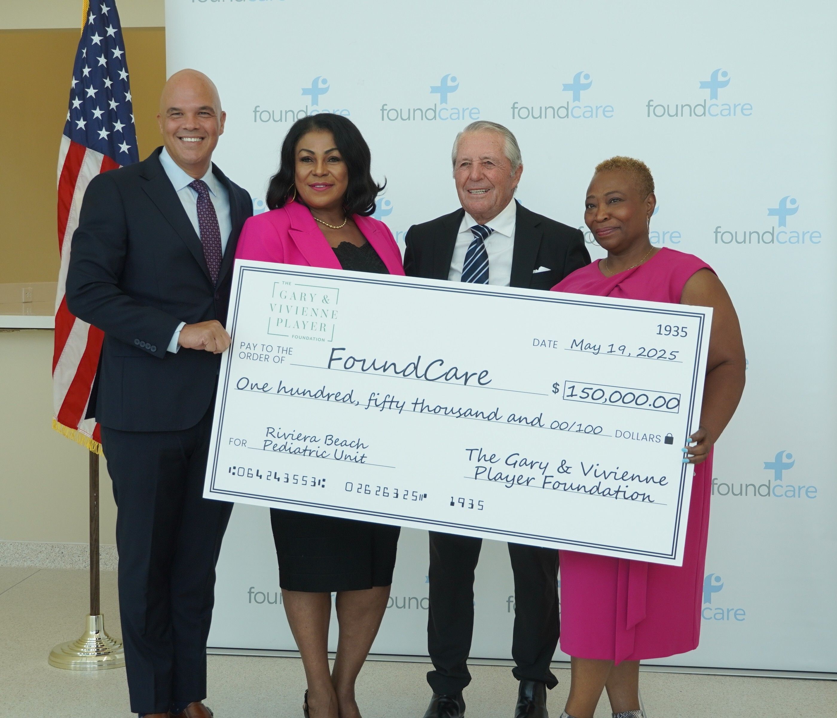Gary Player presented a check from his and his wife's foundation to FoundCare on Monday morning. Pictured from left to right: FoundCare CEO Christopher Irizarry, FoundCare founder and former CEO Yolette Bonnet, Gary Player, and FoundCare Board President V