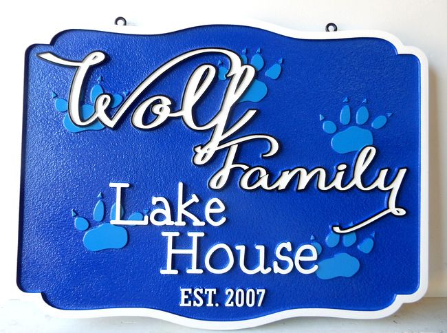 M22906 - Carved HDU Sign for "Wolf Family" Lake House with Wolf Paw Prints