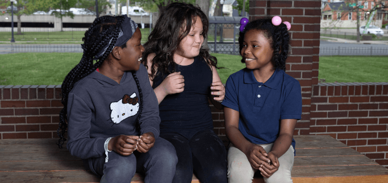 A child in the Home for Families afterschool program works on homework. 