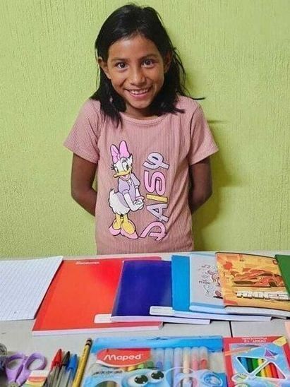 Student with school supplies.