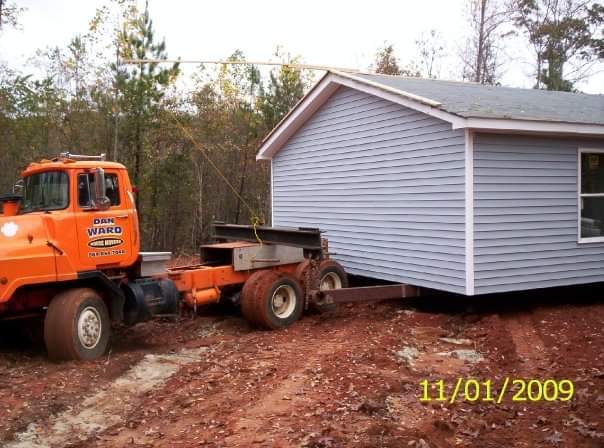 The 2009 Homecoming Build house being moved to its forever home