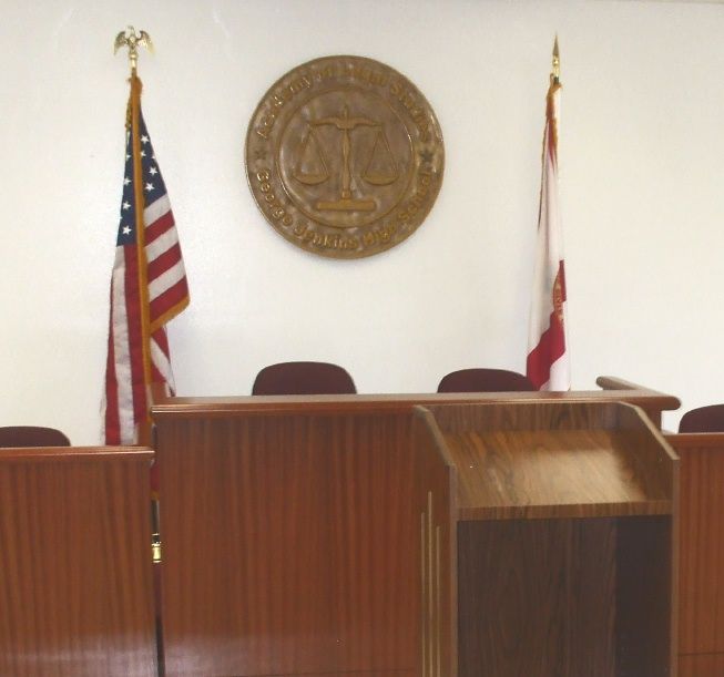 A10802 - Round Wall Plaque, Sandblasted Wood,  Installed in Mock Courtroom