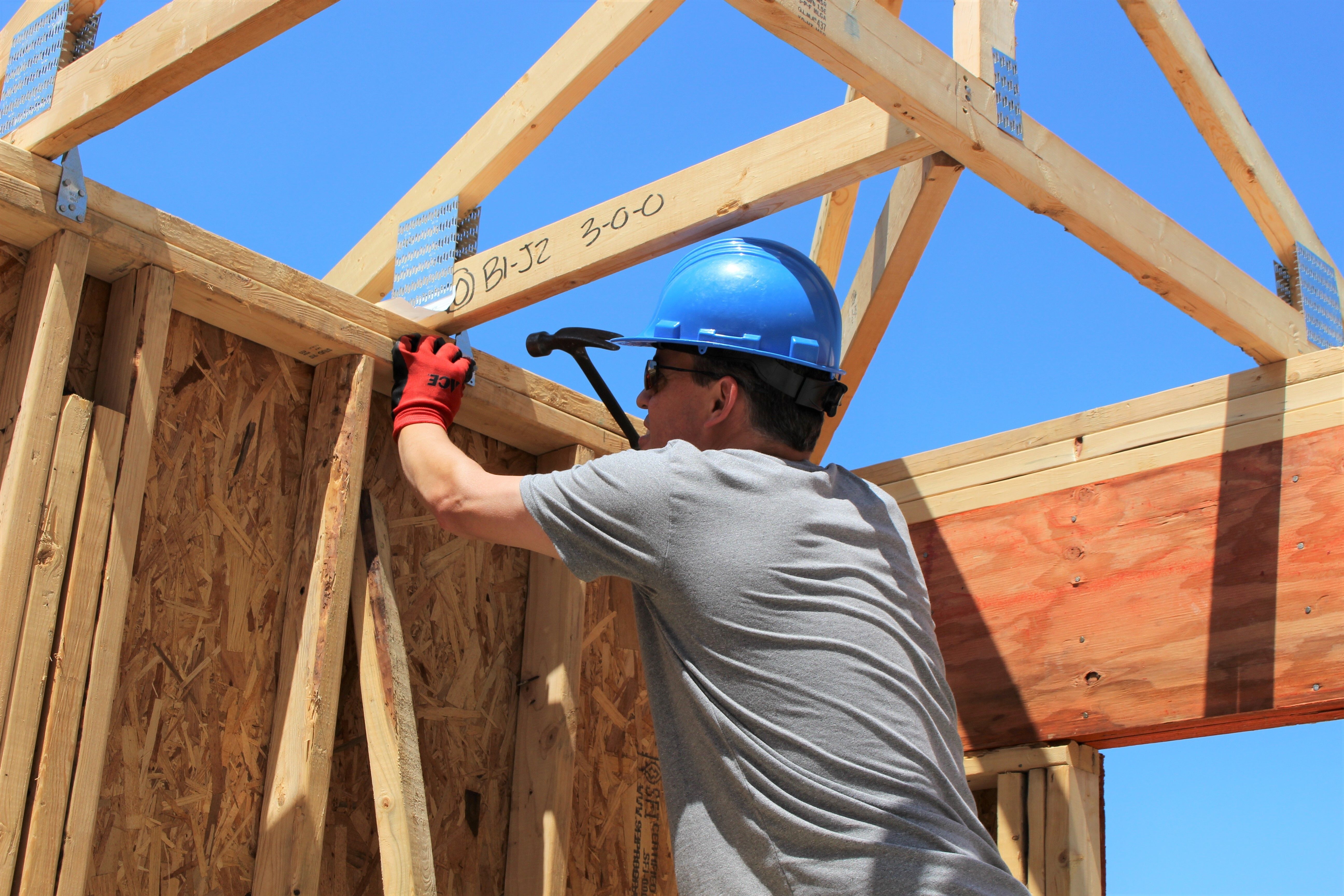 A man hammering