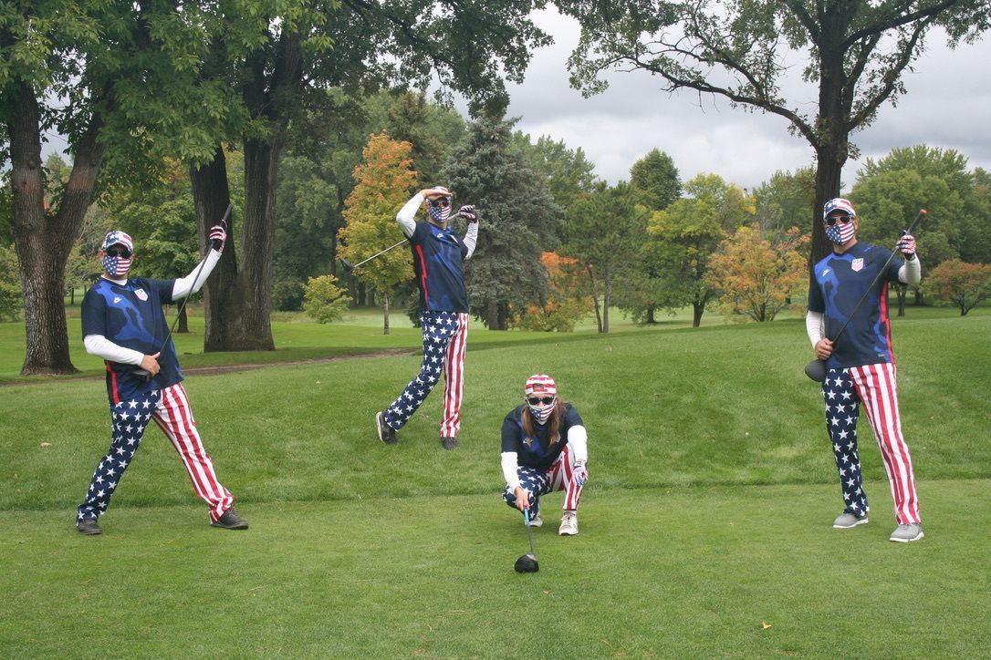 Team Claussen sporting red, white and blue while having fun on the course!