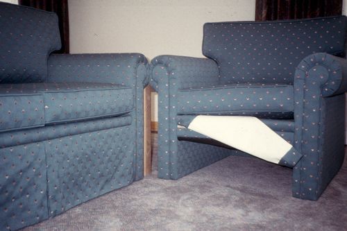 The open space under the seat is concealed by a simple fabric panel.