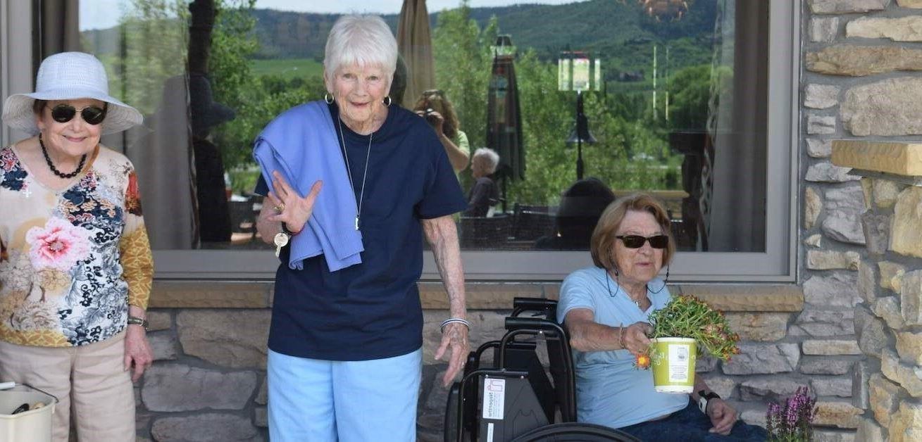 Older adults gardening Casey's Pond senior living community Steamboat Springs 