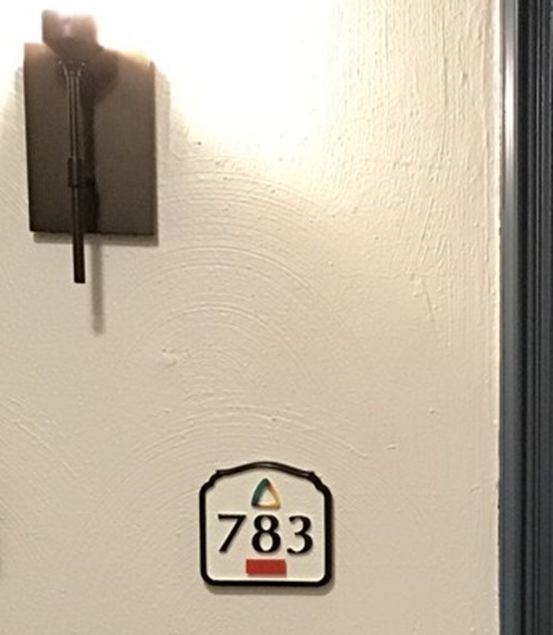 KA20983 - Apartment Number Sign Installed on Wall Adjacent to Door