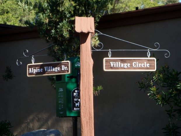 M4762 - Rustic 6 "x 6" Wood Post with Two Lightweight Wrought iron Scroll Brackets   Supporting  Hanging HDU Street Name  Signs       