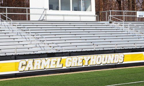 Descon Fence Banners are made of material commonly seen at outdoor facilities: mesh banner.