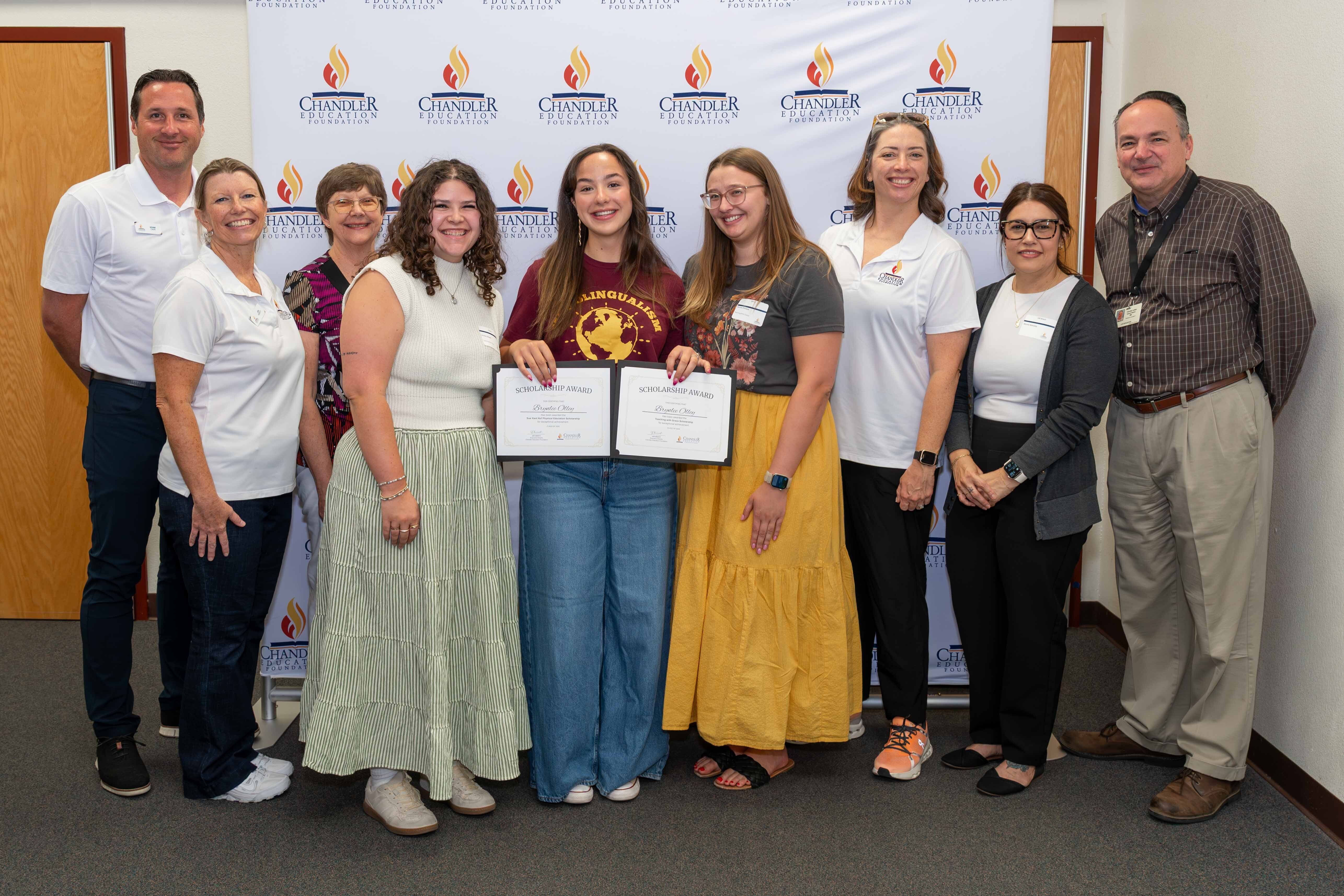 CEF leaders and board members with Teaching With Grace Scholarship creators and student recipient