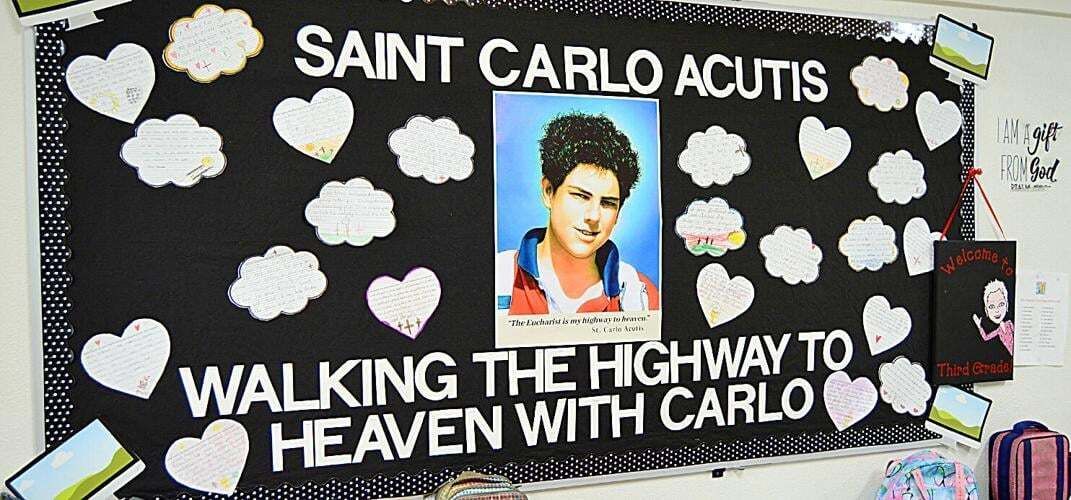 This classroom display shows how St. Carlo Acutis has inspired third-graders at St. Joseph School in Stuart. Thought Carlo Acutis’ example in my faith?” or “What inspires me about St. Carlo Acutis’ life and love for the Eucharist?"
