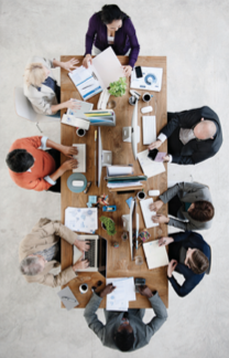 Employers business meeting around table