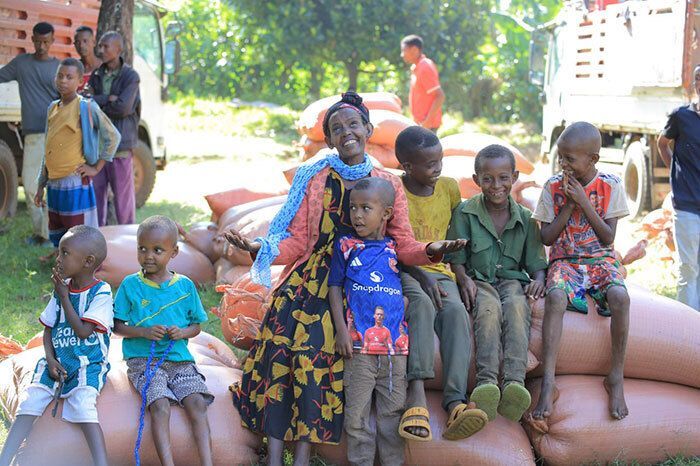 Woman and several children.