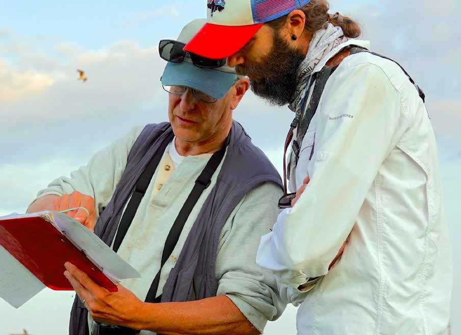 Audubon Director of Avian Research Charles Clarkson (right) discusses field data with Audubon Council of Advisors member Steve Reinert