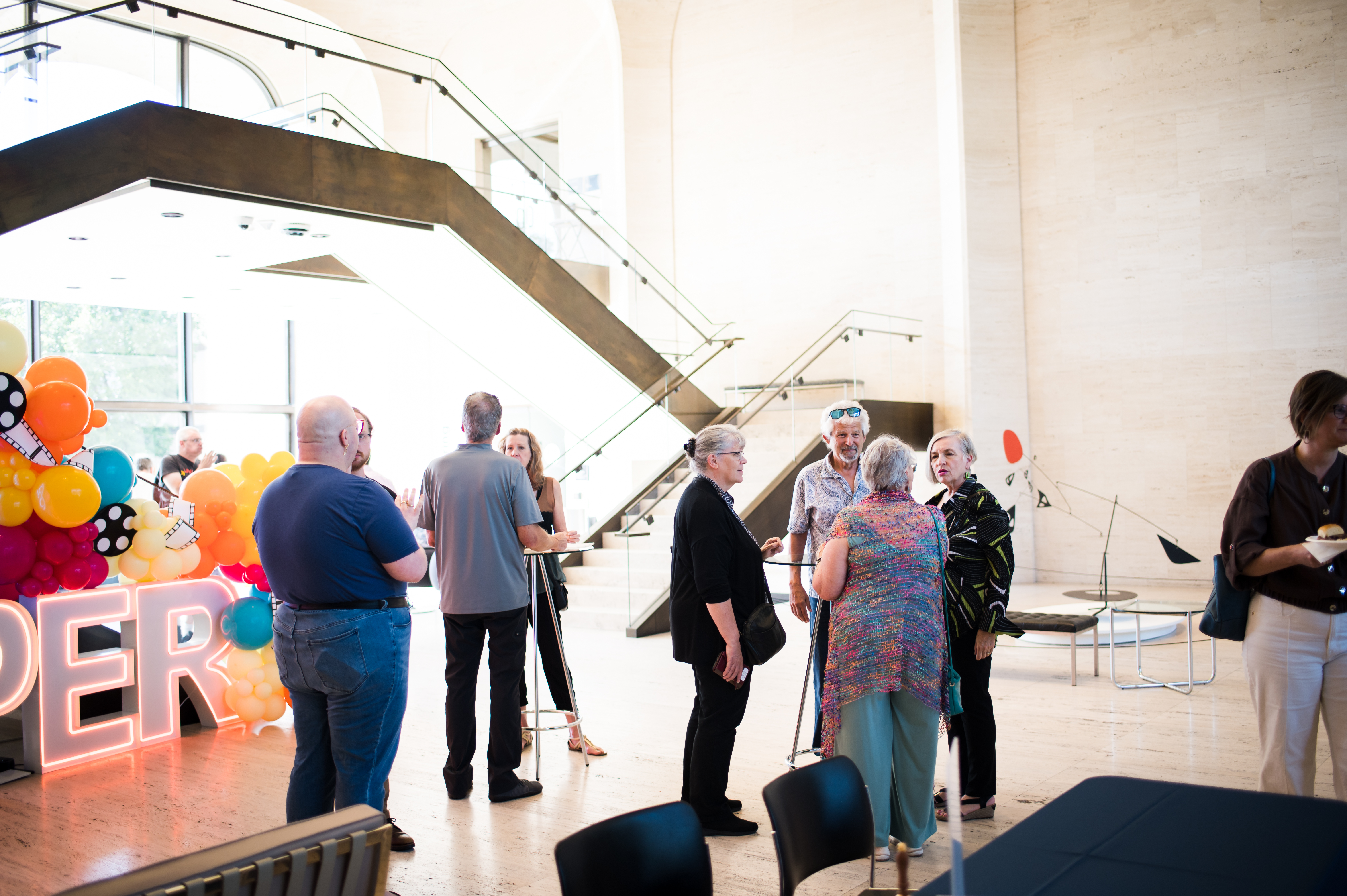 Attendees visit at the screening